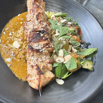Cira - Tunisian Rice with salmon - Mediterranean Near Me - Chicago, Illinois