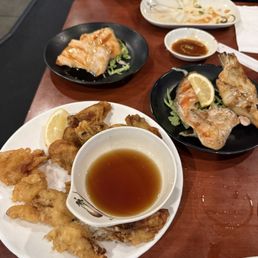 Fried oysters, salmon teriyaki, salmon collar, hamachi collard greens