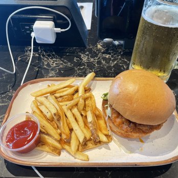 Ember - Chicken sandwich with 25oz Stella - American Near Me - Houston, Texas