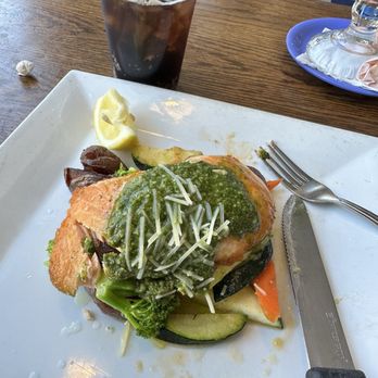Ocean Bleu At Gino's - Fresh salmon over lightly seasoned sautéed fresh veggie medley. - Seafood Near Me - Newport, Oregon Ocean Bleu At Gino's - Fresh salmon over lightly seasoned sautéed fresh veggie medley. - Seafood Near Me - Newport, Oregon