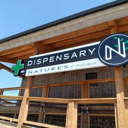 Nature's Herbs & Wellness - A photo of the beautiful wood exterior and the wheelchair-accessible ramp outside the building.