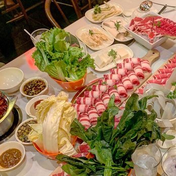 Lao Pot - Central meat is beef. Closer to the right is lamb. Top is another beef variation. - Hot Pot Near Me - Madison Heights, Michigan Lao Pot - Central meat is beef. Closer to the right is lamb. Top is another beef variation. - Hot Pot Near Me - Madison Heights, Michigan