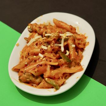 Geddi Route - a plate of pasta on a table - Food Trucks Near Me - Brampton, Ontario