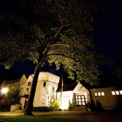 Woman's Club - The outside lit up at night