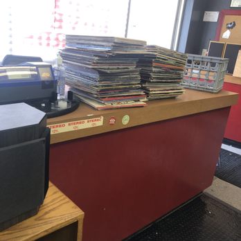Shady Grove Records - Cleaning and pricing the latest arrivals! - Vinyl Records Near Me - Kingman, Arizona