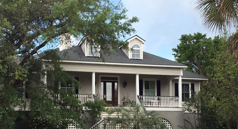 Slide of Rick Ross Exteriors and Roofing