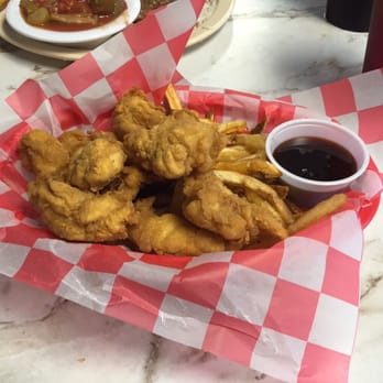 Ray's Restaurant - Perfectly breaded and fried NoBo wings with sweet bourbon molasses sauce on the side. - American Near Me - Dothan, Alabama Ray's Restaurant - Perfectly breaded and fried NoBo wings with sweet bourbon molasses sauce on the side. - American Near Me - Dothan, Alabama