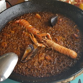 Xiroi Ca La Nuri - The Paella dont look inviting at all, looks over cooked and very lacking in seafruits :/ But it was tasty still. - Seafood Near Me - Barcelona, B Xiroi Ca La Nuri - The Paella dont look inviting at all, looks over cooked and very lacking in seafruits :/ But it was tasty still. - Seafood Near Me - Barcelona, B