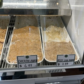 Backyard BBQ - three trays of food in a display case - Armenian Near Me - Glendale, California