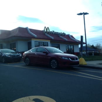 McDonald's - a red car parked in front of a mcdonald's - Burgers Near Me - Winston Salem, North Carolina McDonald's - a red car parked in front of a mcdonald's - Burgers Near Me - Winston Salem, North Carolina