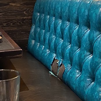 Starfish - Holes in Naugahyde booth -tacky - Asian Fusion Near Me - Laguna Beach, California