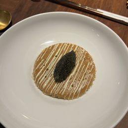 Daikon radish and shrimp cake with lemon, chives caviar