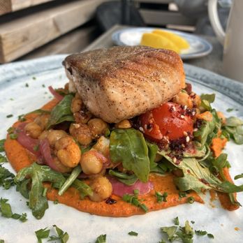 Sea Rocket Oyster House - Salmon with romesco sauce and chickpeas - Cocktail Bars Near Me - Charlottetown, Prince Edward Island Sea Rocket Oyster House - Salmon with romesco sauce and chickpeas - Cocktail Bars Near Me - Charlottetown, Prince Edward Island