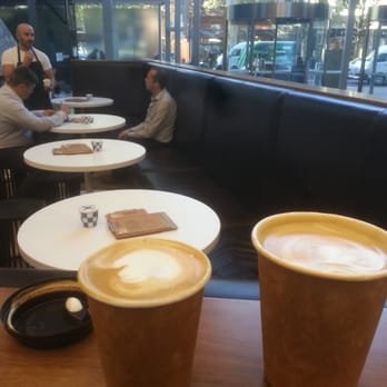 Where's Marcel? - Caffe Lattes AUD3.50 small, AUD4 medium, Joe the boss in the background - Where's Marcel, Melbourne - Coffee & Tea Near Me - Melbourne, VIC Where's Marcel? - Caffe Lattes AUD3.50 small, AUD4 medium, Joe the boss in the background - Where's Marcel, Melbourne - Coffee & Tea Near Me - Melbourne, VIC