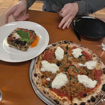 Il Brutto - Burrata pizza and lasagna bolognese - Italian Near Me - Austin, Texas
