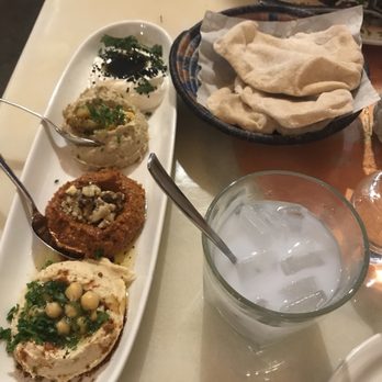 Mamnoon - Sampler of dips for the pita and the traditional drink, Arak - Lebanese Near Me - Seattle, Washington Mamnoon - Sampler of dips for the pita and the traditional drink, Arak - Lebanese Near Me - Seattle, Washington