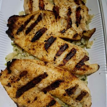 California Fish Grill - 3 piece tilapia over cauliflower rice with house seasoning - Seafood Near Me - Citrus Heights, California