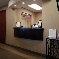 Beaumont Urgent Care - Check in counter. 2 employees here this morning. Very pleasant and helpful
