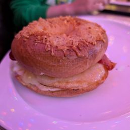 Asiago bagel, bacon, egg, and cheddar Asiago bagel, bacon, egg, and cheddar