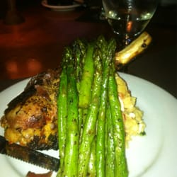 Edgar's Restaurant - Killer Pork Chop!! with creole potato salad and asparagus.