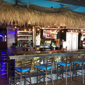 Mangos Cafe - a tiki bar with blue stools - Tacos Near Me - Milwaukee, Wisconsin