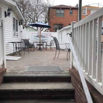 Louie & Ernie's Pizza - The patio - Pizza Near Me - Bronx, New York