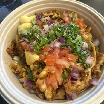 Potato Pit & Juice Bar - Butter Chicken Bowl - Poutineries Near Me - Dearborn, Michigan Potato Pit & Juice Bar - Butter Chicken Bowl - Poutineries Near Me - Dearborn, Michigan