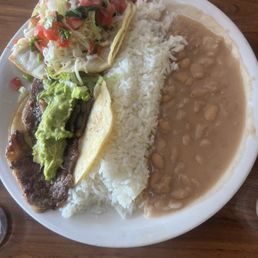 Rib Eye Steak Taco and Fish Taco Combination Plate with Rice and Beans Rib Eye Steak Taco and Fish Taco Combination Plate with Rice and Beans