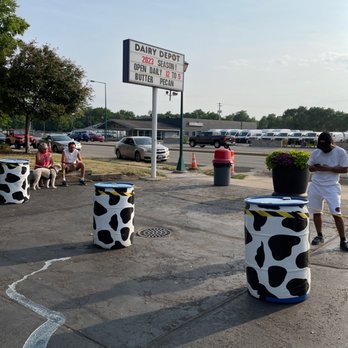Dairy Depot - a cow print buckets in a parking lot - Ice Cream & Frozen Yogurt Near Me - Loves Park, Illinois Dairy Depot - a cow print buckets in a parking lot - Ice Cream & Frozen Yogurt Near Me - Loves Park, Illinois