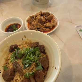 Show Mian - Top to bottom: minced pork dry noodles, chili chicken (cold dish), and chili beef dry noodles - Chinese Near Me - Plano, Texas Show Mian - Top to bottom: minced pork dry noodles, chili chicken (cold dish), and chili beef dry noodles - Chinese Near Me - Plano, Texas