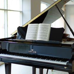 Kingdom Seed Academy - Grand piano in our concert hall
