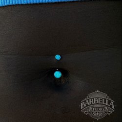 Fresh navel piercing with two sky blue opals!
Pierced by Cat, and styled by Ariel.