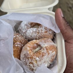 Manuela Malasada - Big Island - Malasada filled with creme brulee, topped with powdered sugar an cinnamon