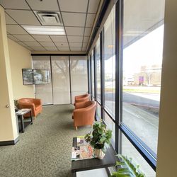 Denti Belli Dentistry - Lobby seating area with tv and magazines and plants