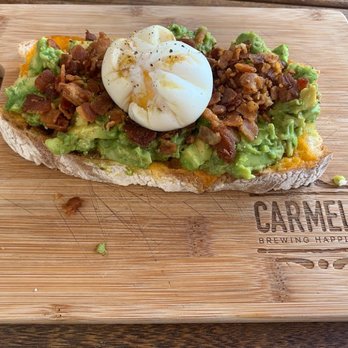 Carmela Coffee - East Boca - Breakfast avocado toast (bread, avocado, cheddar cheese, bacon, poached egg) - Coffee & Tea Near Me - Boca Raton, Florida Carmela Coffee - East Boca - Breakfast avocado toast (bread, avocado, cheddar cheese, bacon, poached egg) - Coffee & Tea Near Me - Boca Raton, Florida