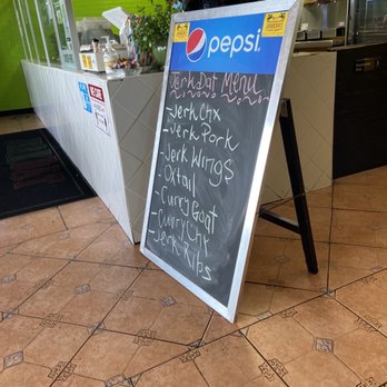 Jerk Dat - a sign in front of a restaurant - Caribbean Near Me - Las Vegas, Nevada Jerk Dat - a sign in front of a restaurant - Caribbean Near Me - Las Vegas, Nevada