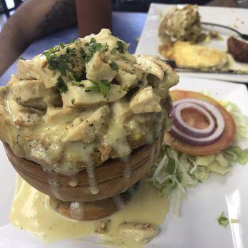 Chimiking Restaurant - Mofongo and chicken with a garlic sauce. DELICIOUS - Latin American Near Me - Orlando, Florida
