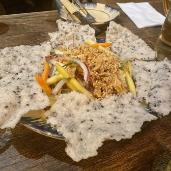 Konia - Mango salad with these light & crispy chips to scoop it on to.  Very shareable. - Vietnamese Near Me - Toronto, Ontario