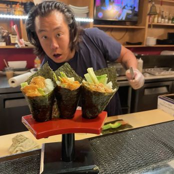 Fuji Roll & Sushi - Three spicy salmon hand rolls made by the man himself, Matthew. - Japanese Near Me - Rialto, California Fuji Roll & Sushi - Three spicy salmon hand rolls made by the man himself, Matthew. - Japanese Near Me - Rialto, California