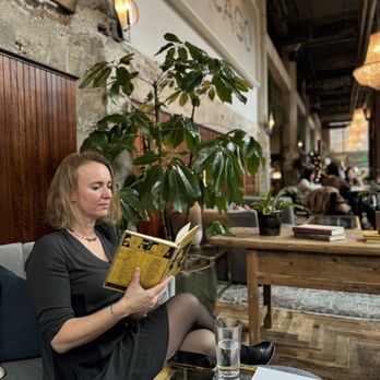 The Allis - Reading in the lounge - Lounges Near Me - Chicago, Illinois
