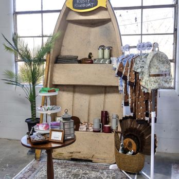 Wonderfilled Boutique - Wooden boat with baby clothes on a clothing rack - Used, Vintage & Consignment Near Me - Clarksville, Tennessee