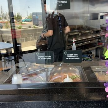 Moku Hawaiian Grill - Mesa - Restaurant view of dressing names, & a staff person in kitchen 6/21/25 - Hawaiian Near Me - Mesa, Arizona Moku Hawaiian Grill - Mesa - Restaurant view of dressing names, & a staff person in kitchen 6/21/25 - Hawaiian Near Me - Mesa, Arizona