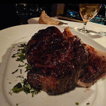 Eiffel Tower Restaurant - Beef ribeye over bone marrow - French Near Me - Las Vegas, Nevada Eiffel Tower Restaurant - Beef ribeye over bone marrow - French Near Me - Las Vegas, Nevada