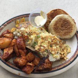 House omelette- home fries and English muffin. Yum! House omelette- home fries and English muffin. Yum!