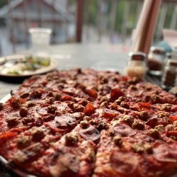 Cruizzers - Sausage and pepperoni large pizza (light cheese).