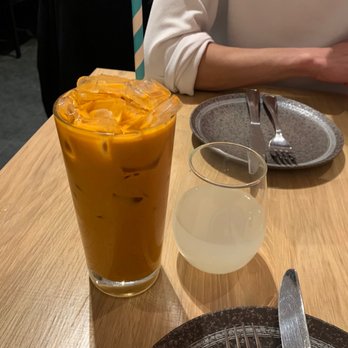 Kothai Republic - Thai Iced Tea (left) and Sake (right) - Wine Bars Near Me - San Francisco, California Kothai Republic - Thai Iced Tea (left) and Sake (right) - Wine Bars Near Me - San Francisco, California