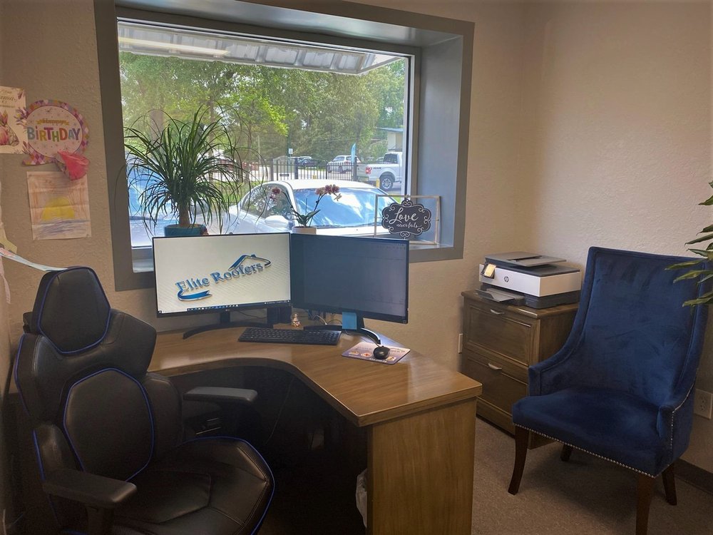 Slide of Elite Roofers