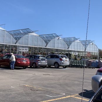 Green Acre Farms - a man standing in a parking lot - Fruits & Veggies Near Me - Rochester, New York
