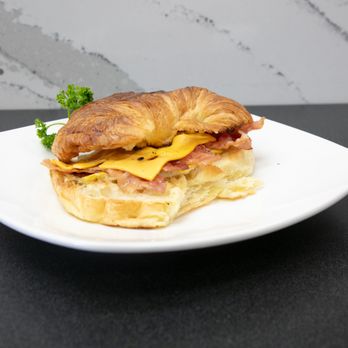 The Fusion Cafe - a croissant sandwich on a plate - Coffee & Tea Near Me - Phoenix, Arizona The Fusion Cafe - a croissant sandwich on a plate - Coffee & Tea Near Me - Phoenix, Arizona