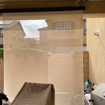 OC Electric - Motorized outdoor patio shade w/new electrical outlet - Electricians Near Me